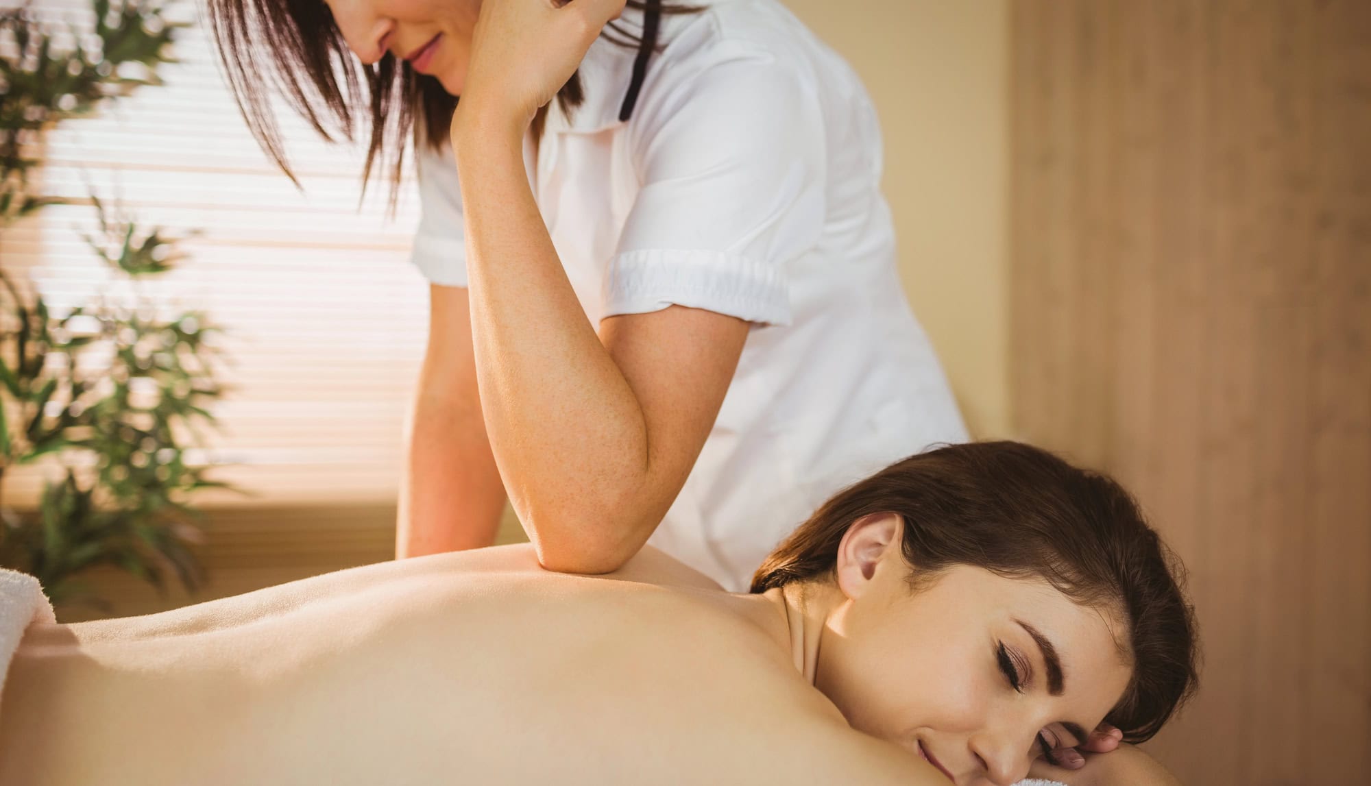 Young woman getting a massage Young woman getting a massage