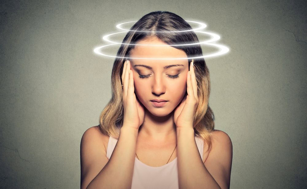 woman having vertigo